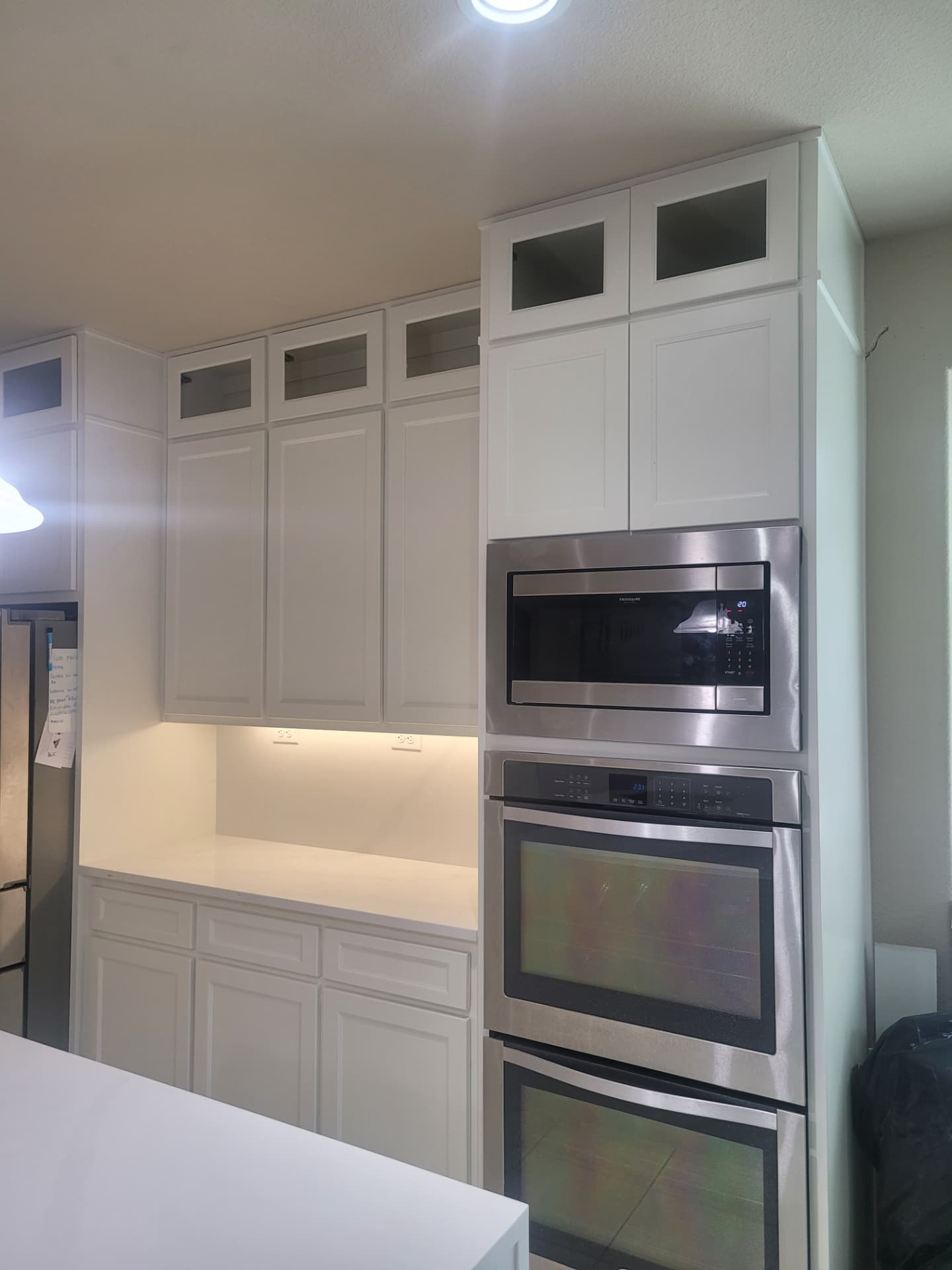 Custom built-in double oven cabinetry